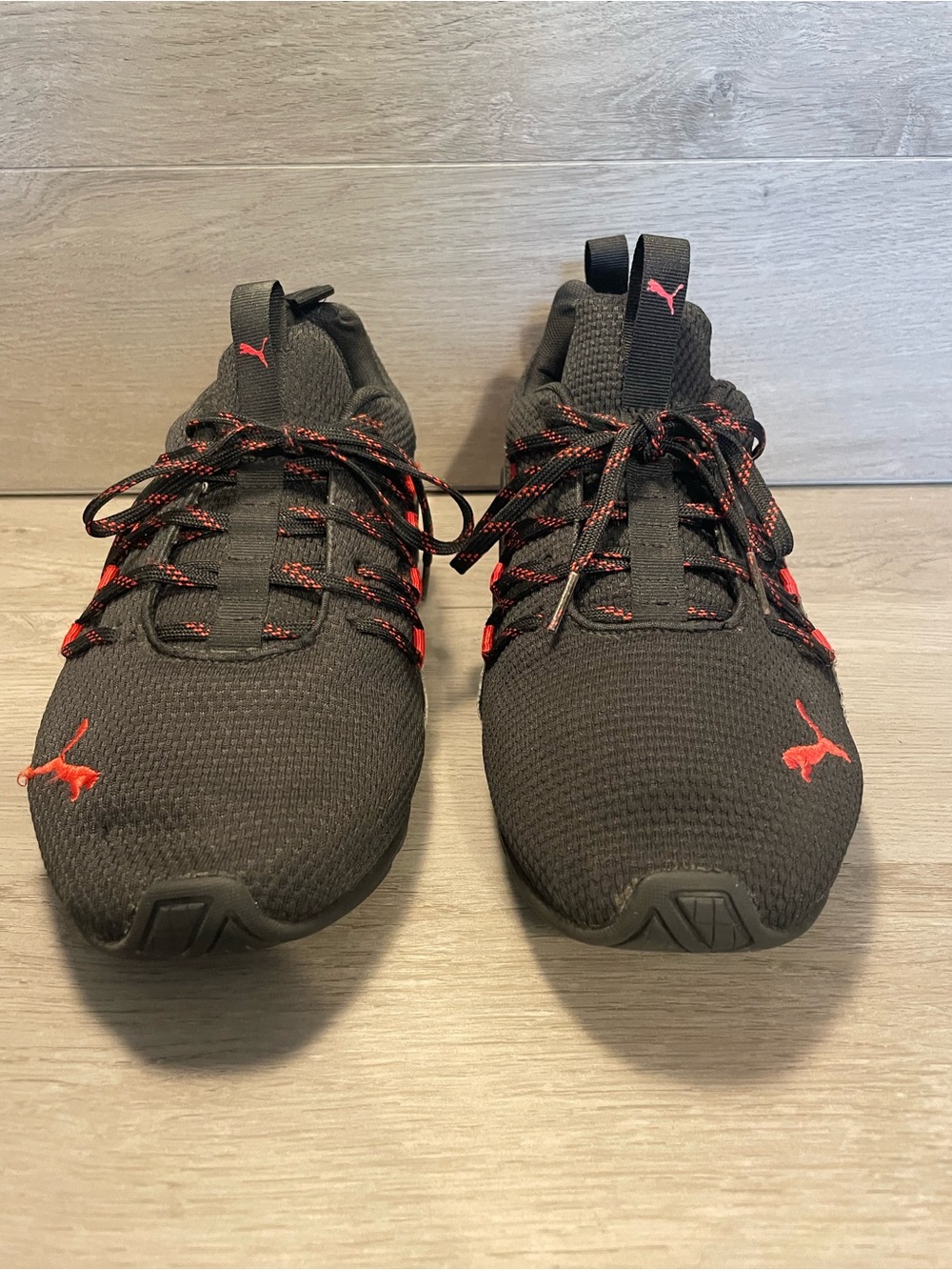 Puma Black Athletic Sneakers with Red Accents